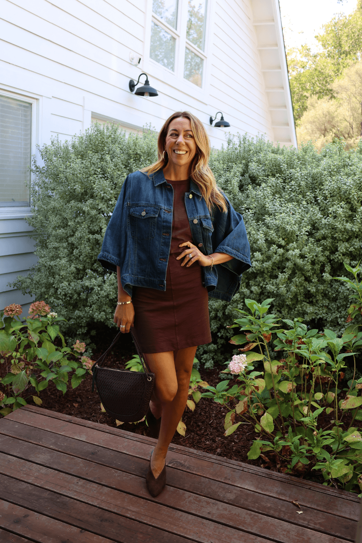 Dark denim square-cape jacket with button front and chest pockets