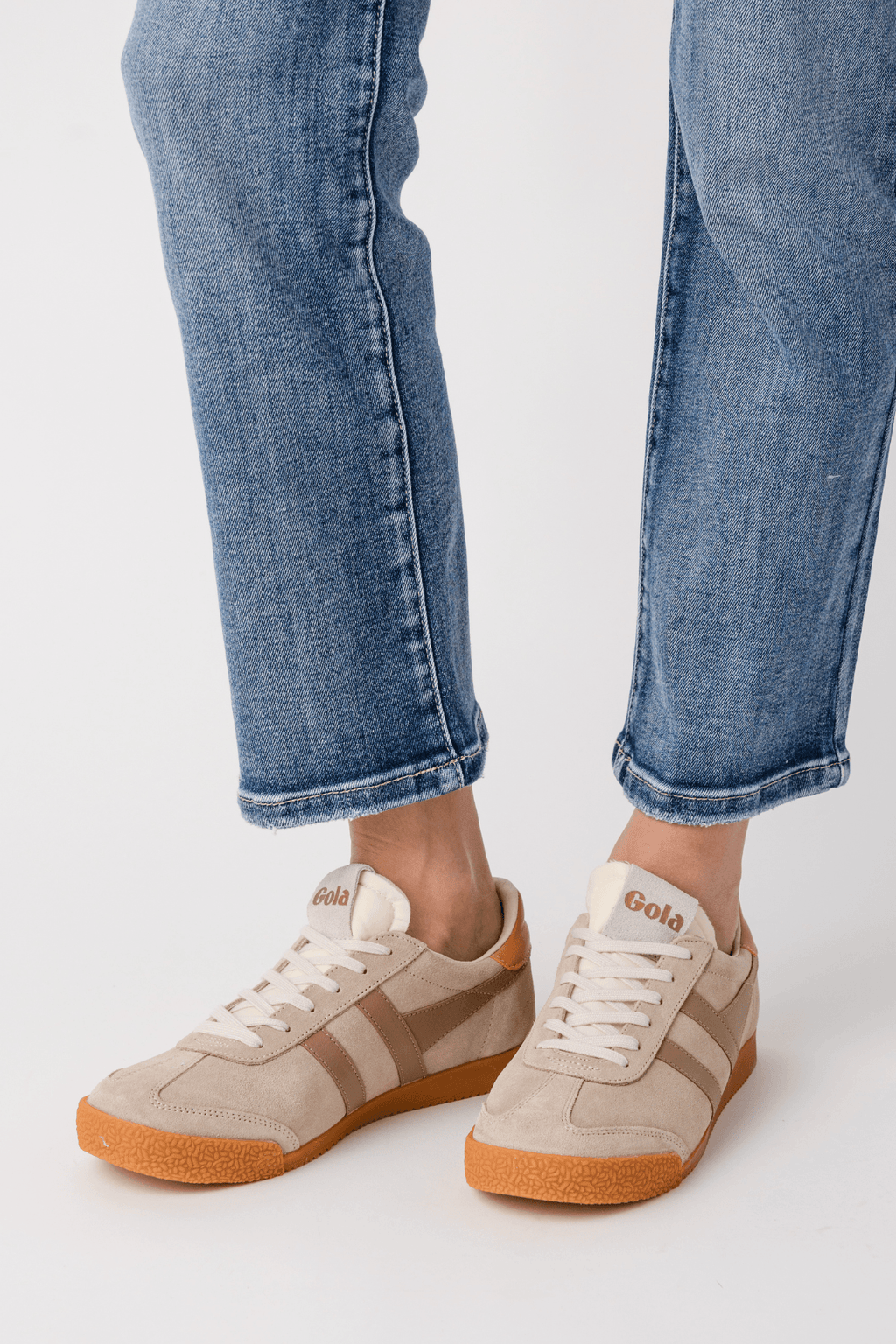 Low-top Gola sneakers in bone with caramel stripes and terracotta rubber sole