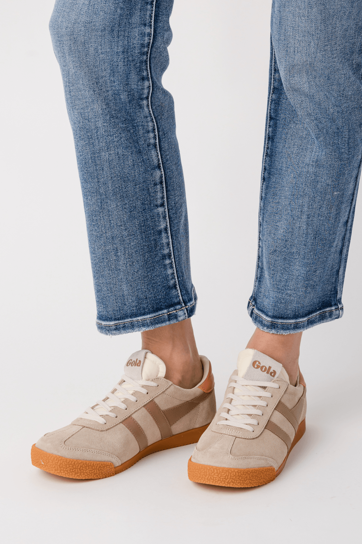 Low-top Gola sneakers in bone with caramel stripes and terracotta rubber sole