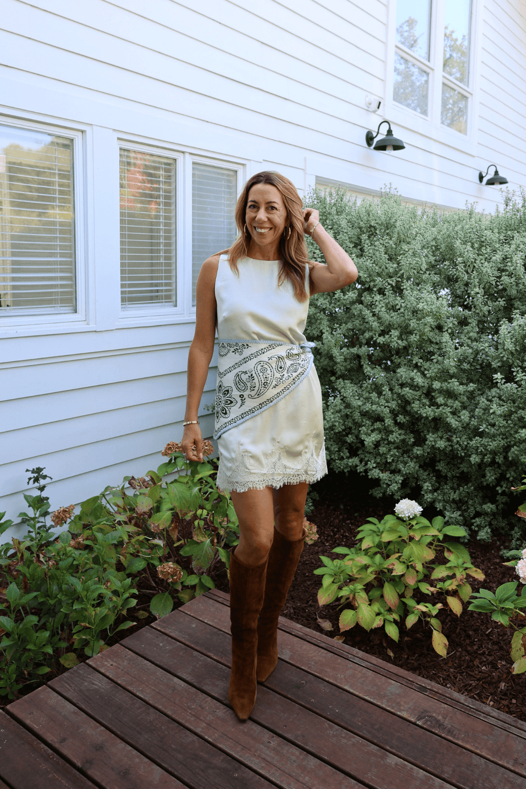 Cream lace mini dress, sleeveless with scalloped hem trim