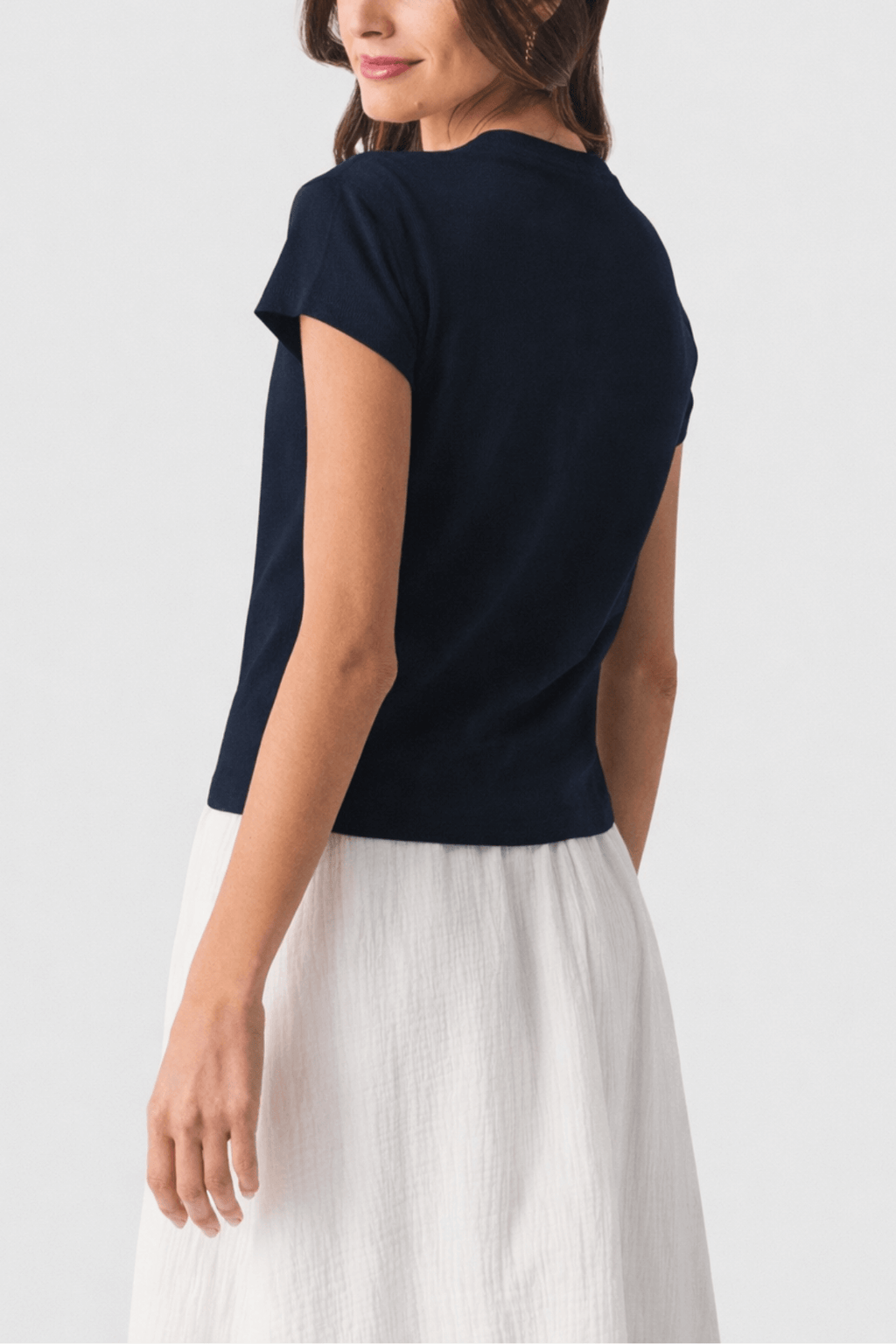 Navy slub tee with short sleeves and crew neck, side profile