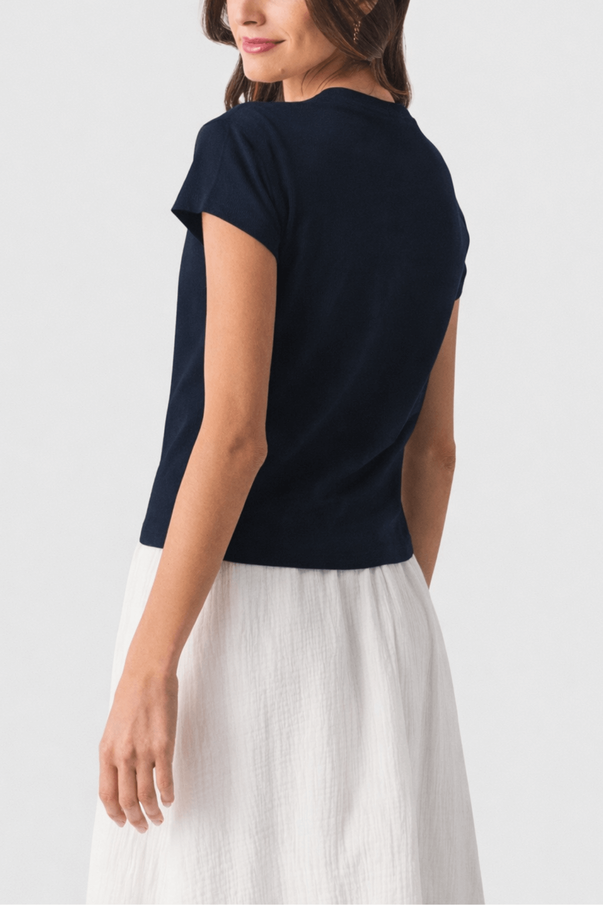 Navy slub tee with short sleeves and crew neck, side profile