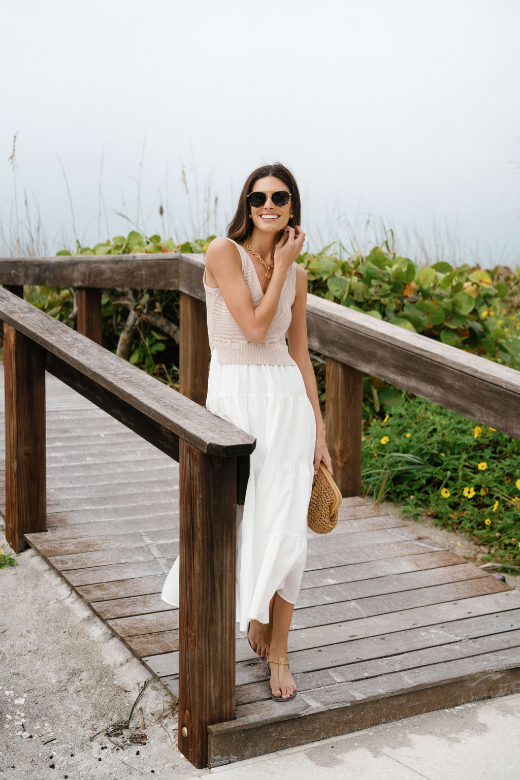 Ankle-length sleeveless colorblocked maxi dress with taupe bodice and layered white skirt