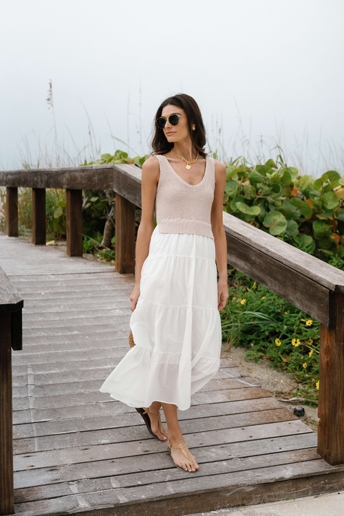 Sleeveless colorblocked maxi dress with taupe bodice and ruffled tiered white skirt