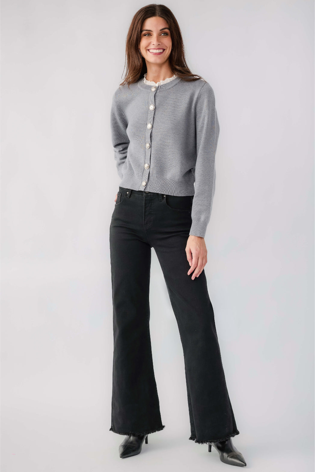 Black high-rise wide-leg jeans with raw hem and relaxed, straight fit