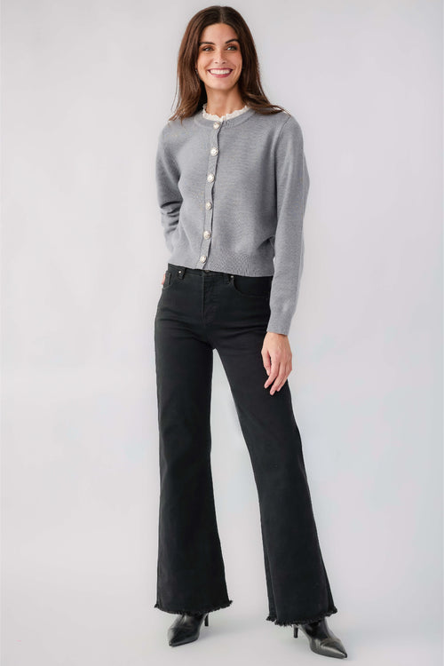 Black high-rise wide-leg jeans with raw hem and relaxed, straight fit