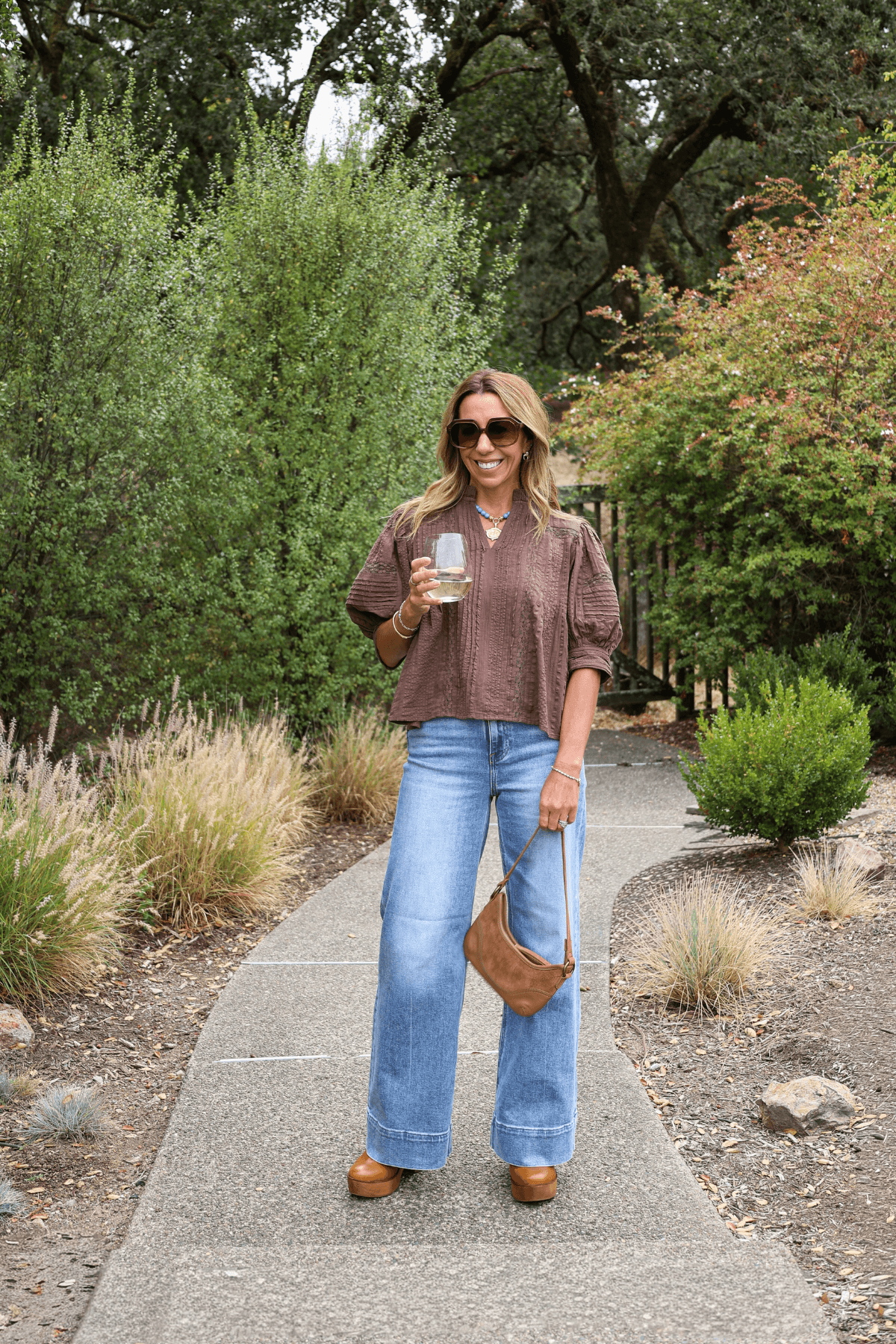 Women’s brown leather wedge clogs with chunky sole