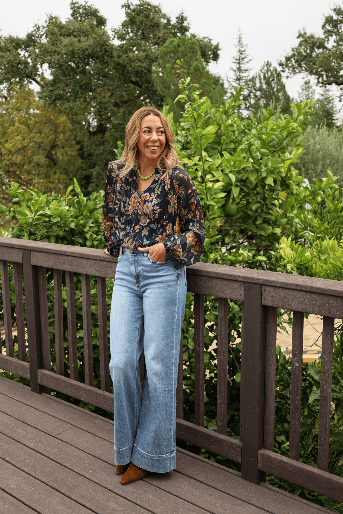Navy floral lurex pleated top with long sleeves