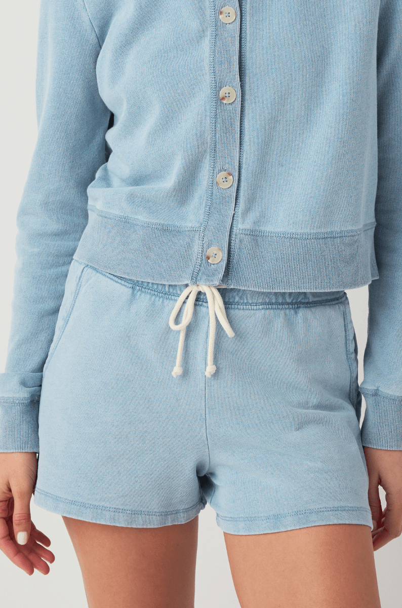 Women’s light blue knit denim shorts with drawstring and gathered elastic waist