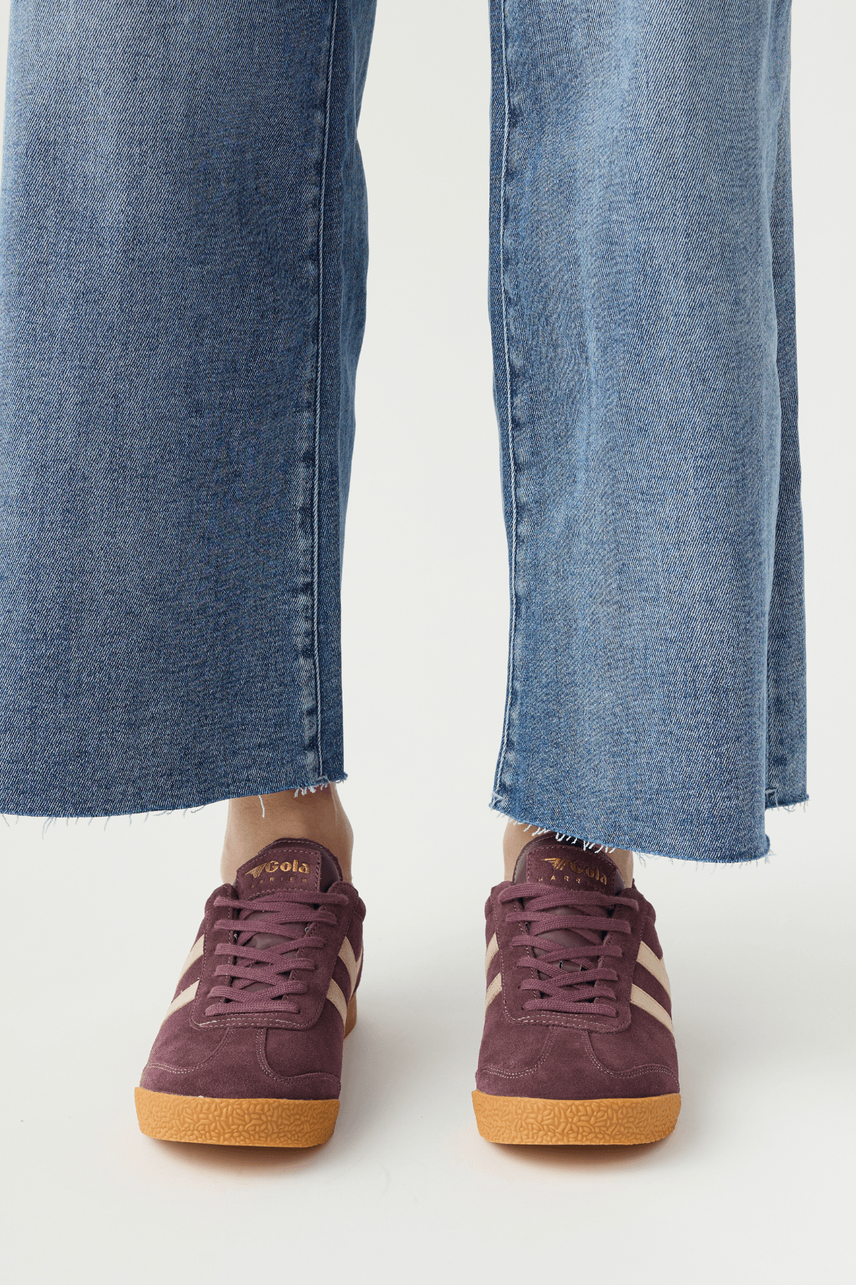 Cocoa brown lace-up sneakers, front view, with white stripes and gum rubber sole