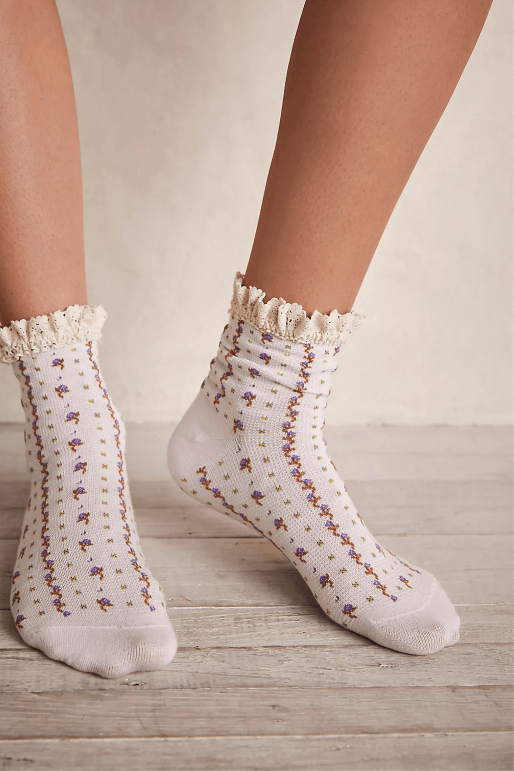 Ivory ankle socks with colorful sprinkle pattern and ruffled cuff