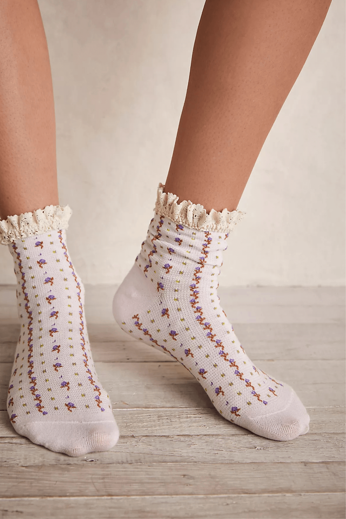 Ivory ankle socks with colorful sprinkle pattern and ruffled cuff
