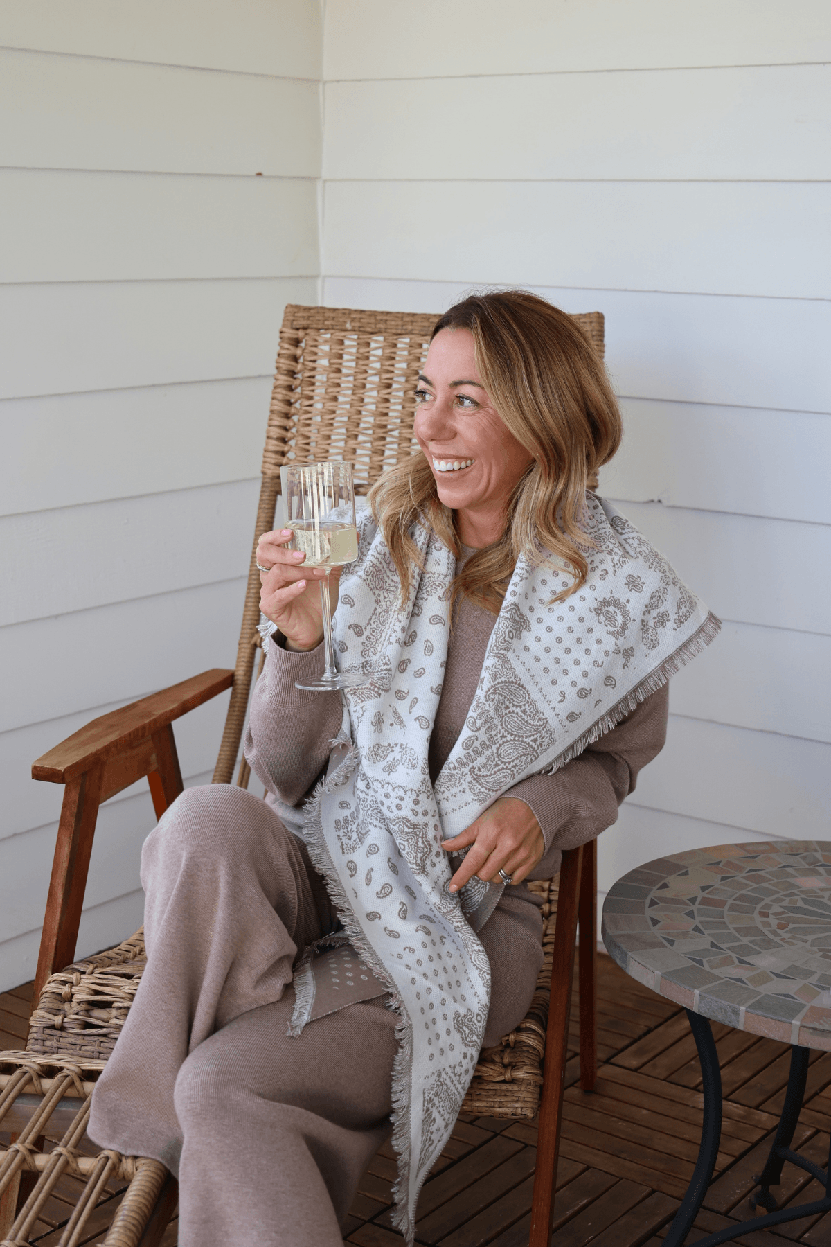 All-over print cardigan sweater with open front and long sleeves.