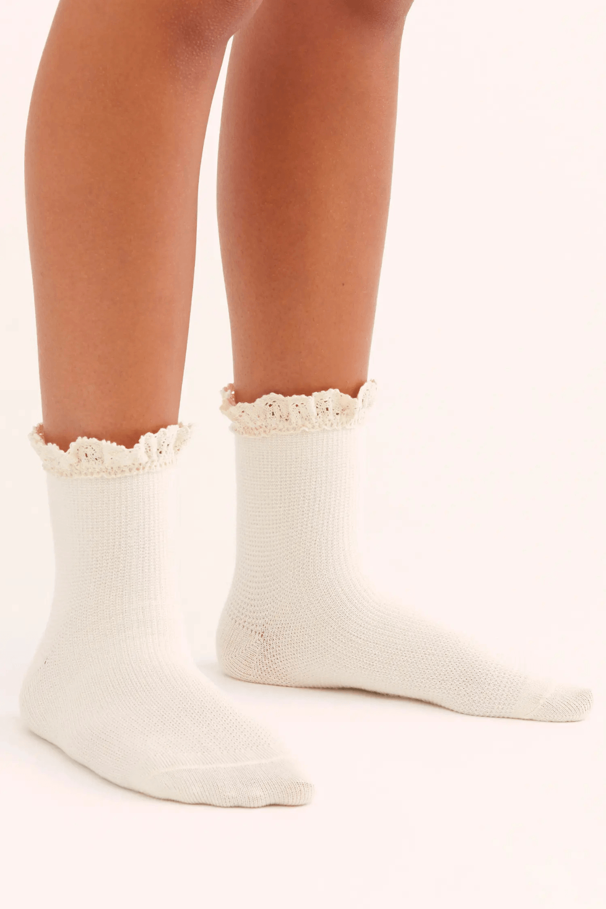 Ivory waffle-knit crew socks with ruffled cuffs