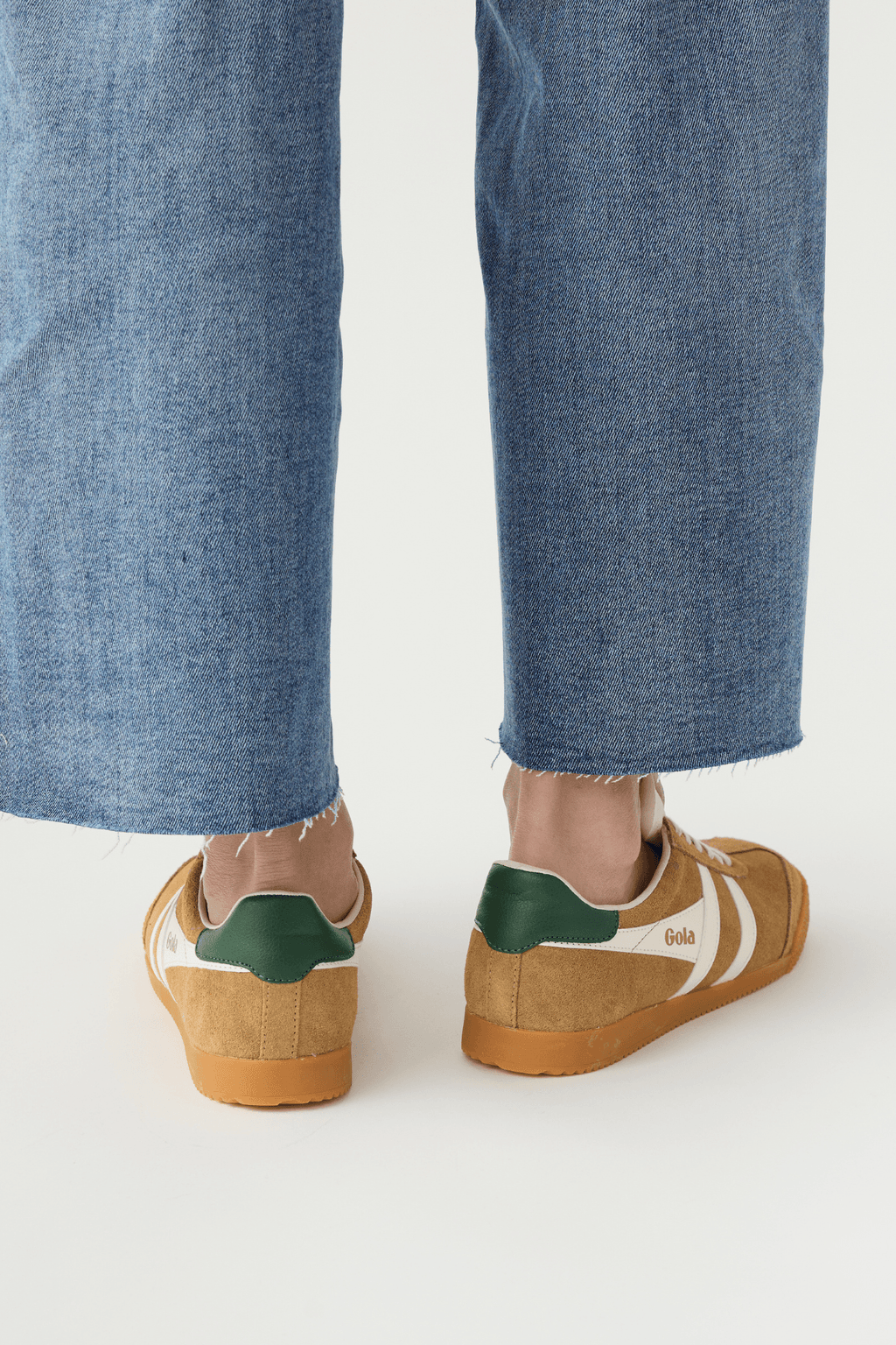 Gola Elan sneakers: tan suede, off-white stripes, green heel tab, gum sole.