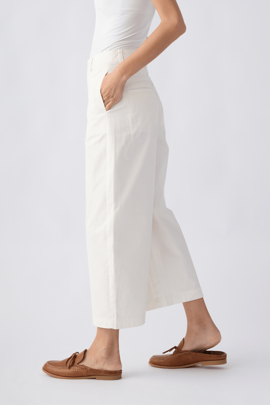 Ivory chino pants with back yoke, cropped straight legs and belt loops