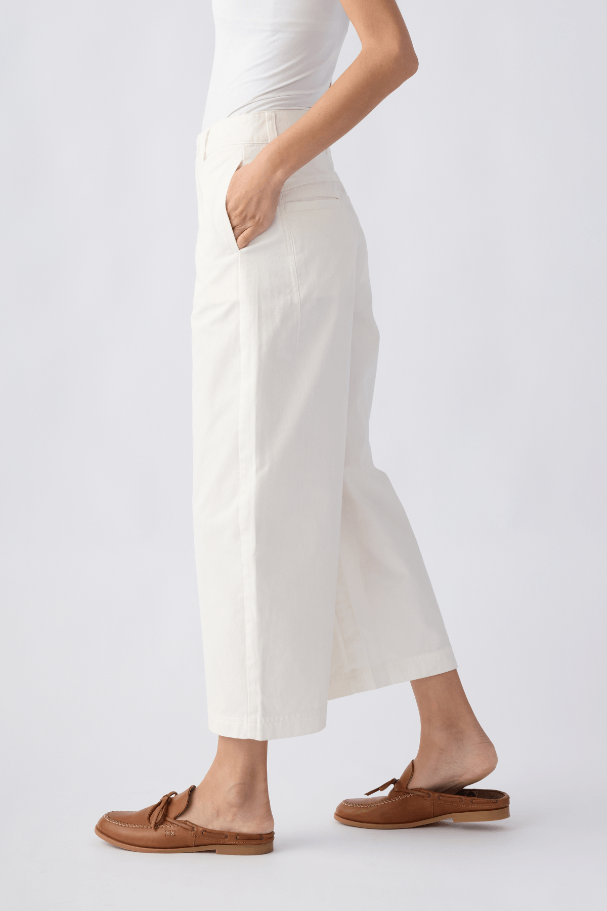 Ivory chino pants with back yoke, cropped straight legs and belt loops