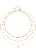 Gold triple-layer pendant necklace with dangling charms and round blue gemstone