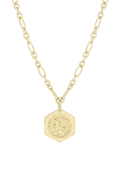 Gold chain necklace with embossed hexagon pendant, close-up