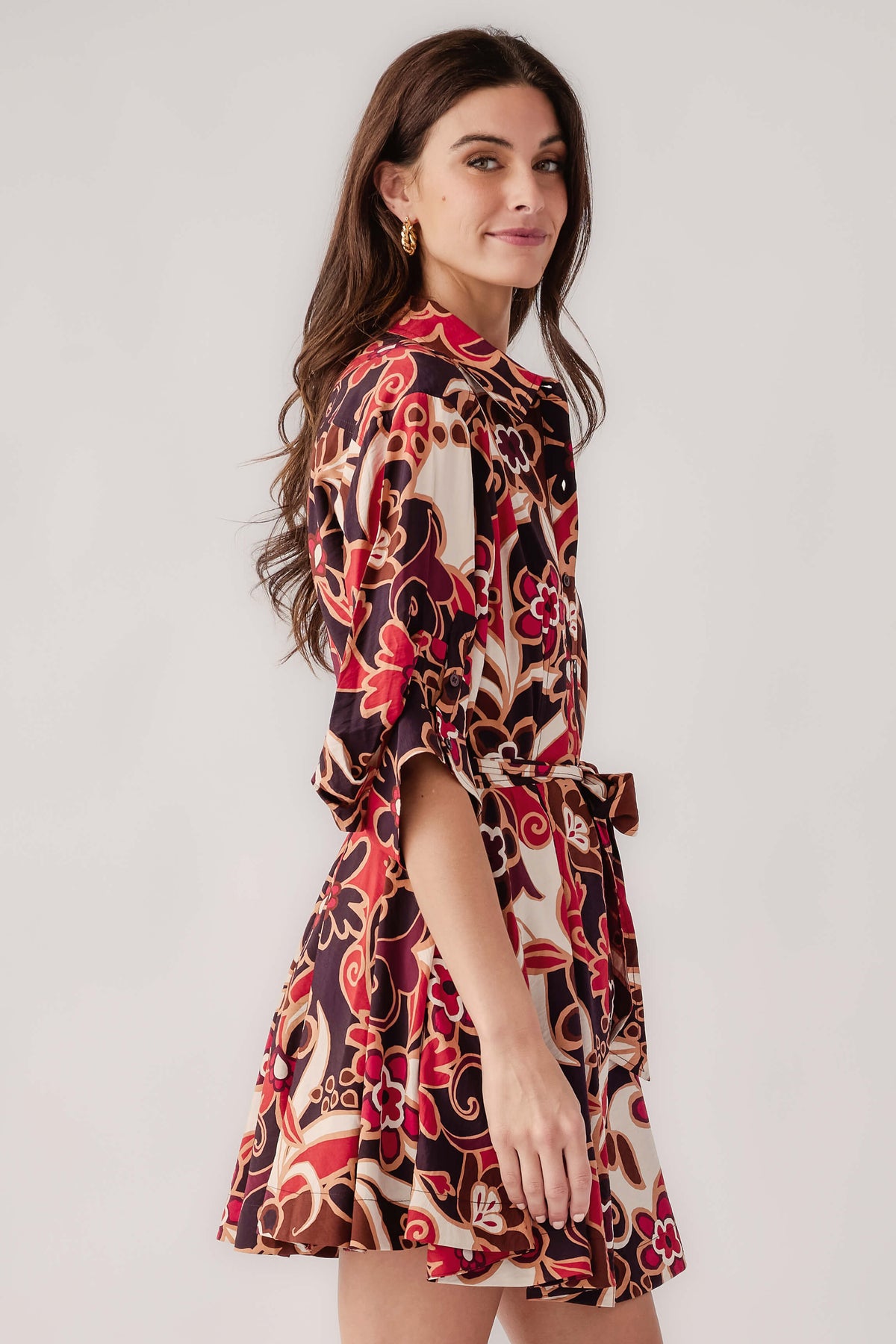 Abstract floral shirt dress, side view, belted waist, 3/4 sleeves, purple-red-cream