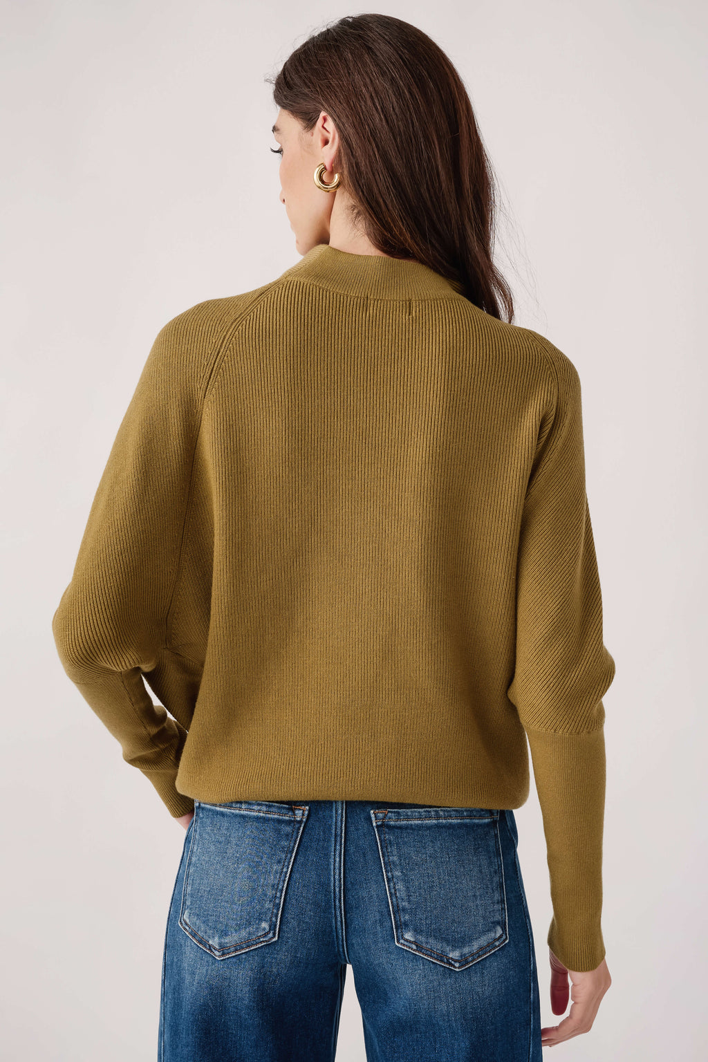 Olive slouch-neck dolman pullover sweater viewed from the back