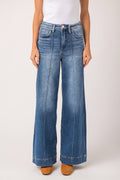 High-rise wide-leg jeans, medium wash denim with front pintuck detail and belt loops
