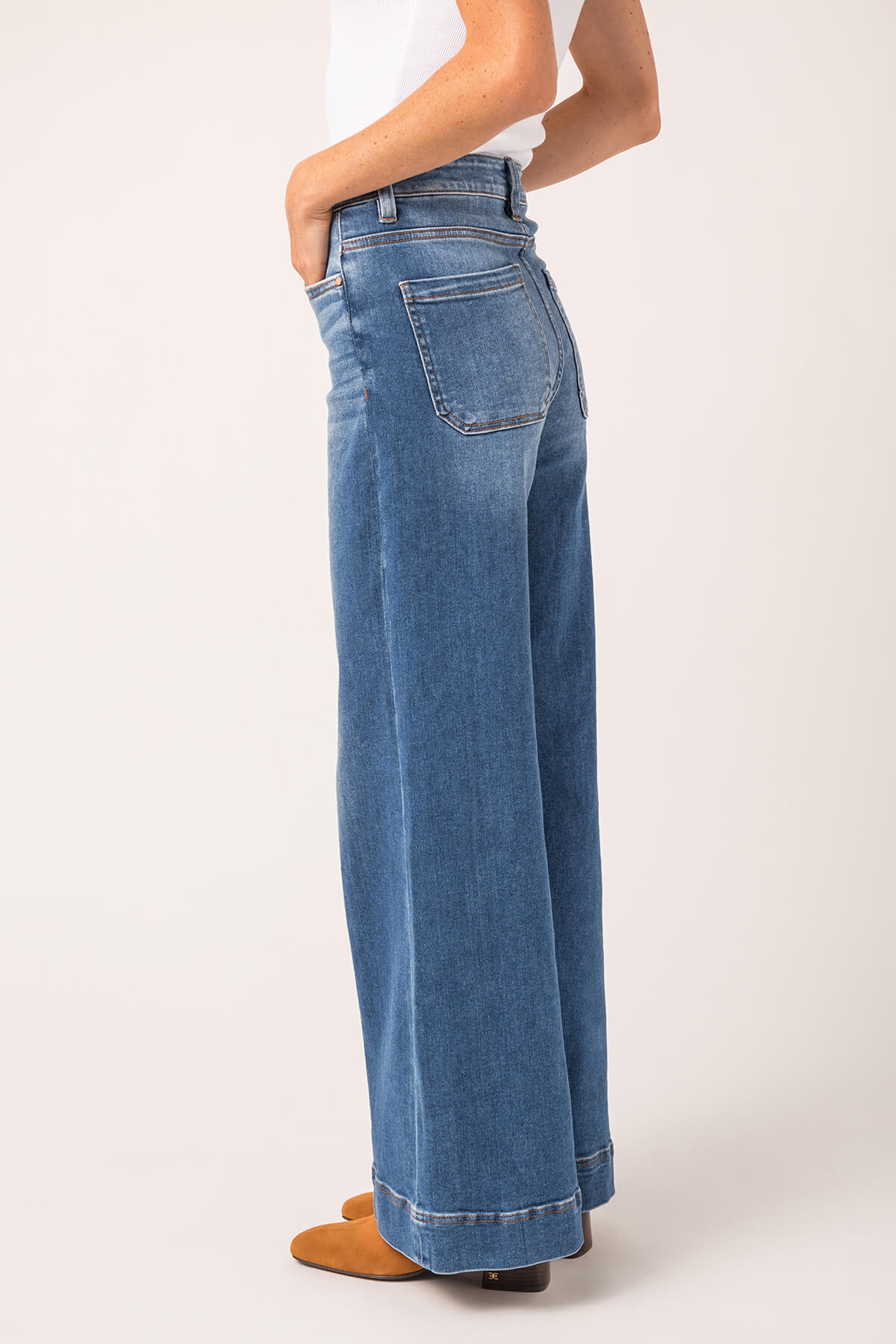 High-rise wide-leg ankle jeans in medium wash blue denim with back patch pockets