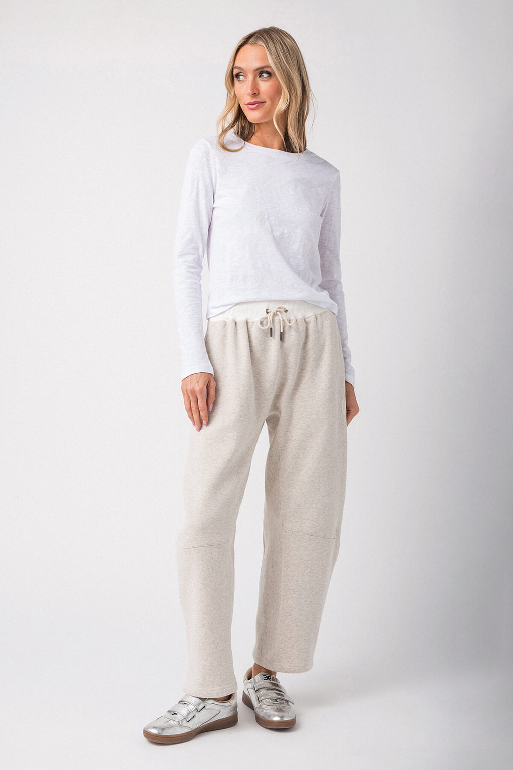 Heather gray drawstring lounge pants with relaxed tapered legs and side pockets
