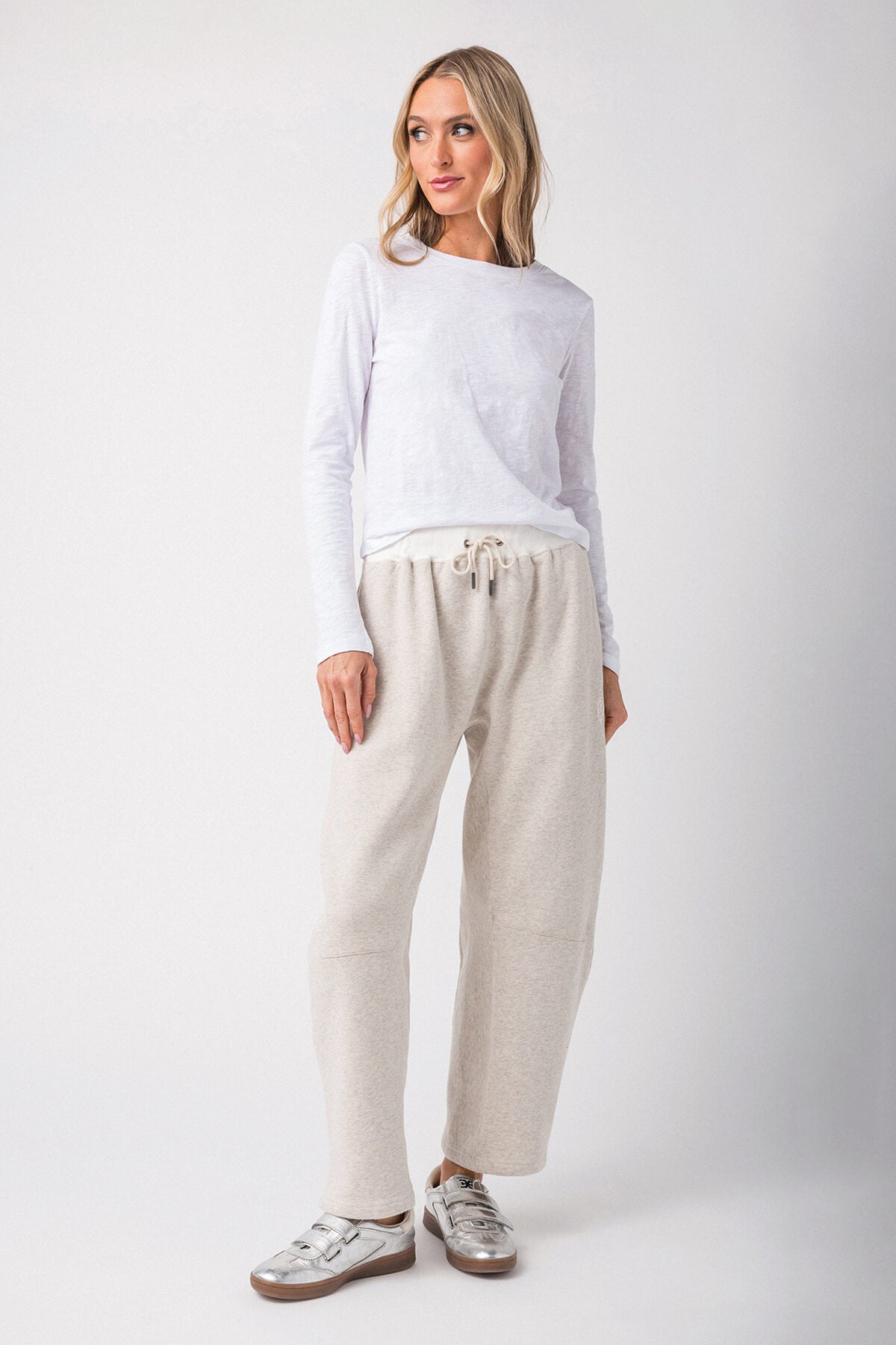 Heather gray drawstring lounge pants with relaxed tapered legs and side pockets