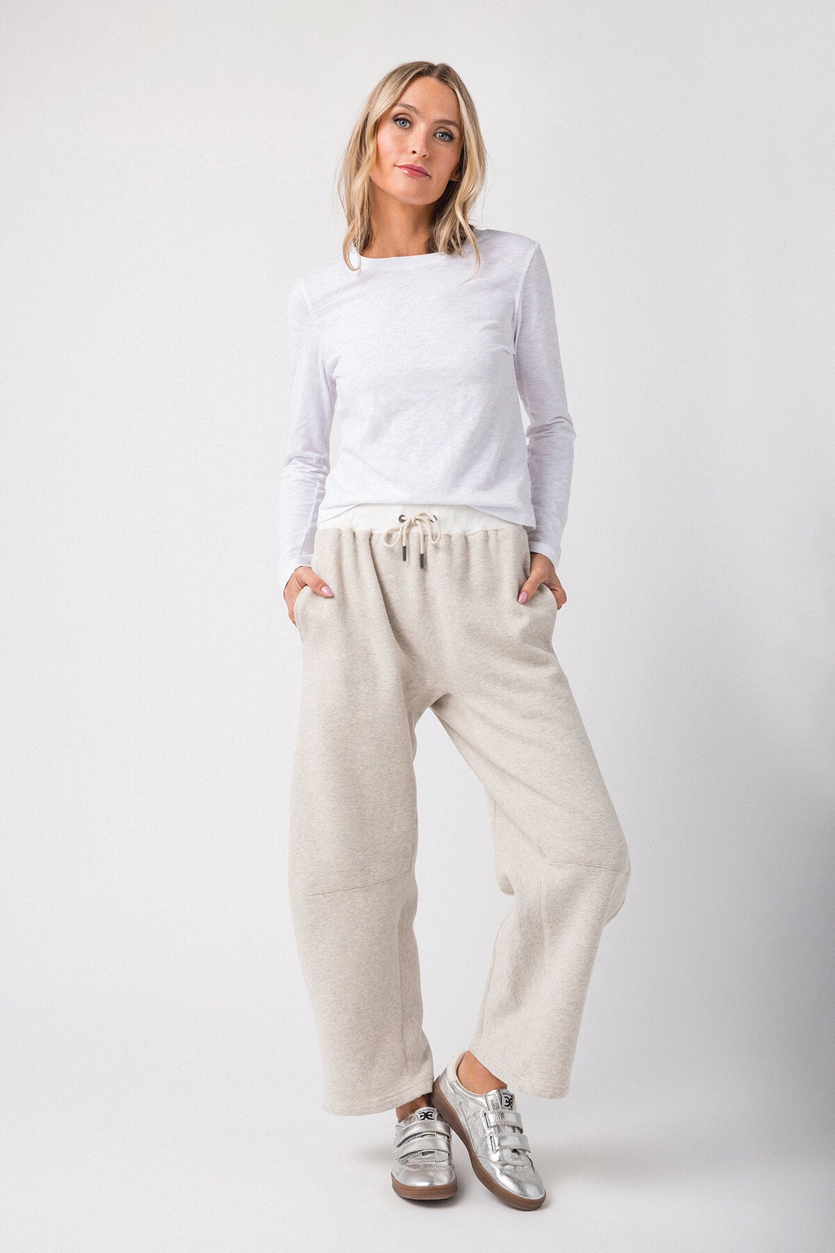 Heather gray drawstring sweatpants with elastic waistband and cuffed ankle hem