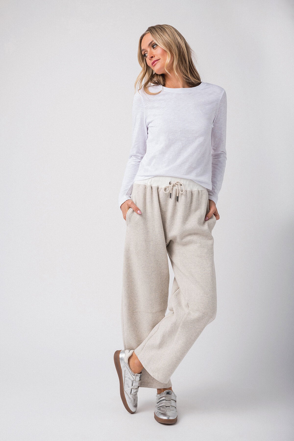 Heather gray relaxed drawstring pants with side pockets and tapered fit