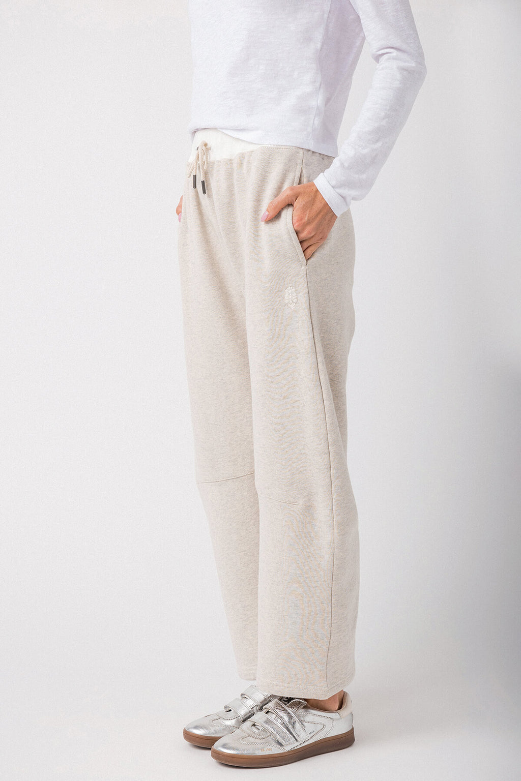 Heather gray jogger pants with elastic waistband, drawstring, and side pockets
