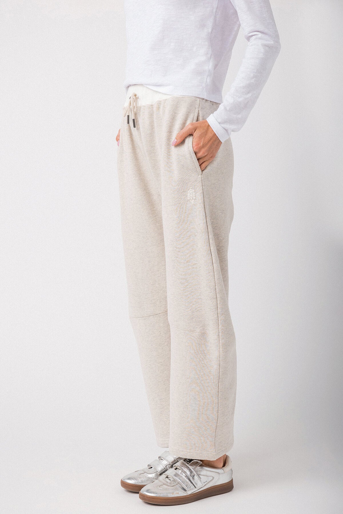 Heather gray jogger pants with elastic waistband, drawstring, and side pockets