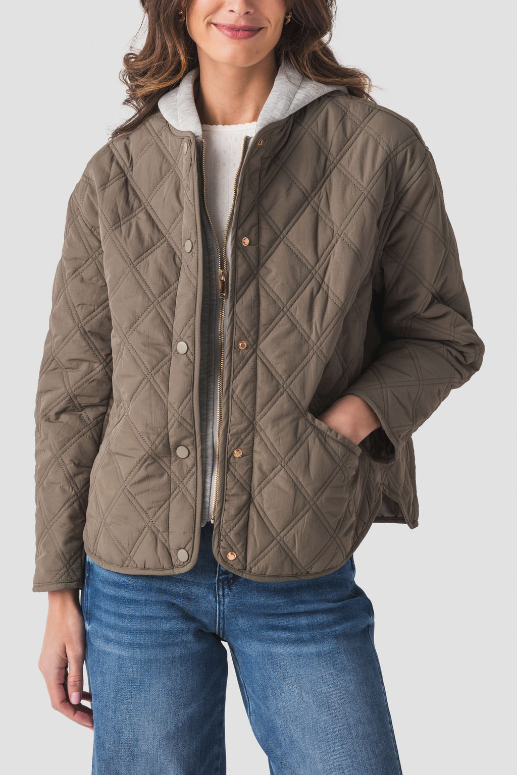 Olive quilted jacket hoodie with diamond quilting, hood, and zipper front
