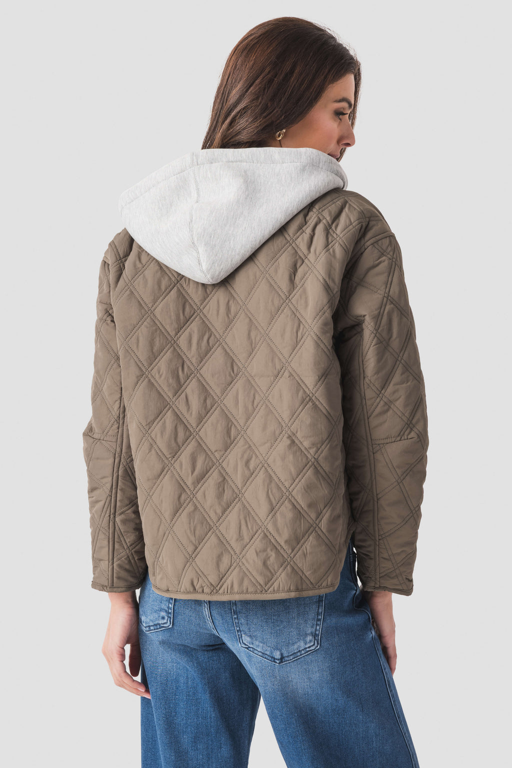 Olive quilted jacket hoodie showing hood back and diamond pattern