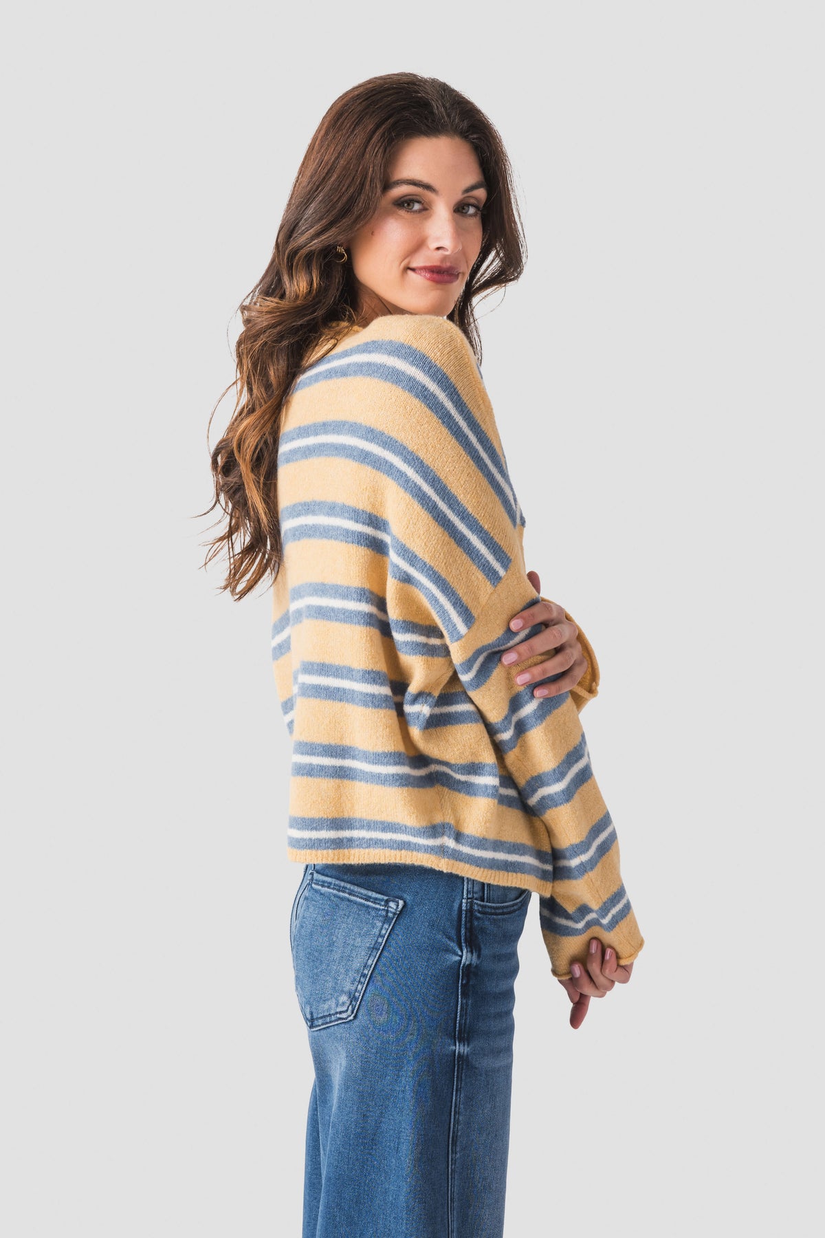 Honey-and-blue striped piper cardigan, side view showing button placket