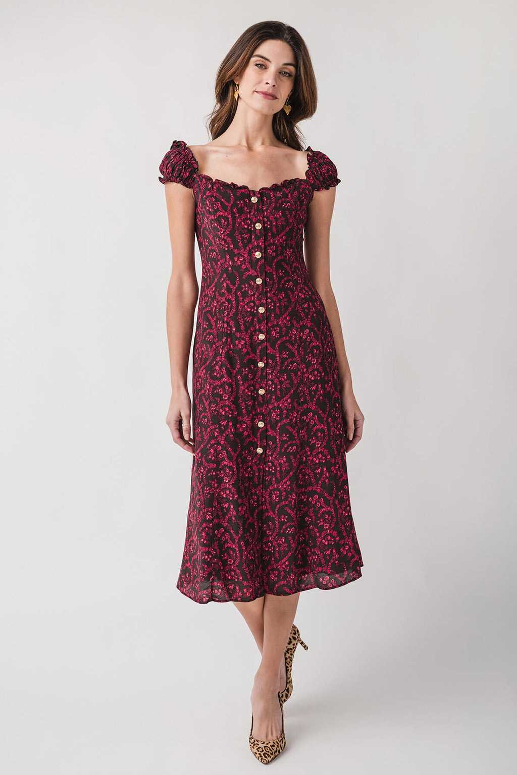 Red patterned midi dress with puff cap sleeves and button-front bodice