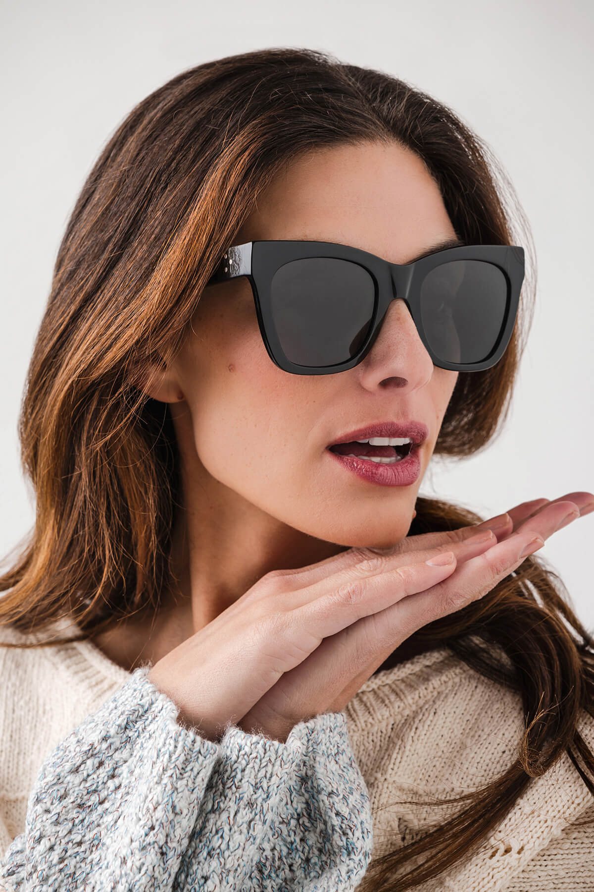 Black polarized sunglasses with dark lenses, wide square frames