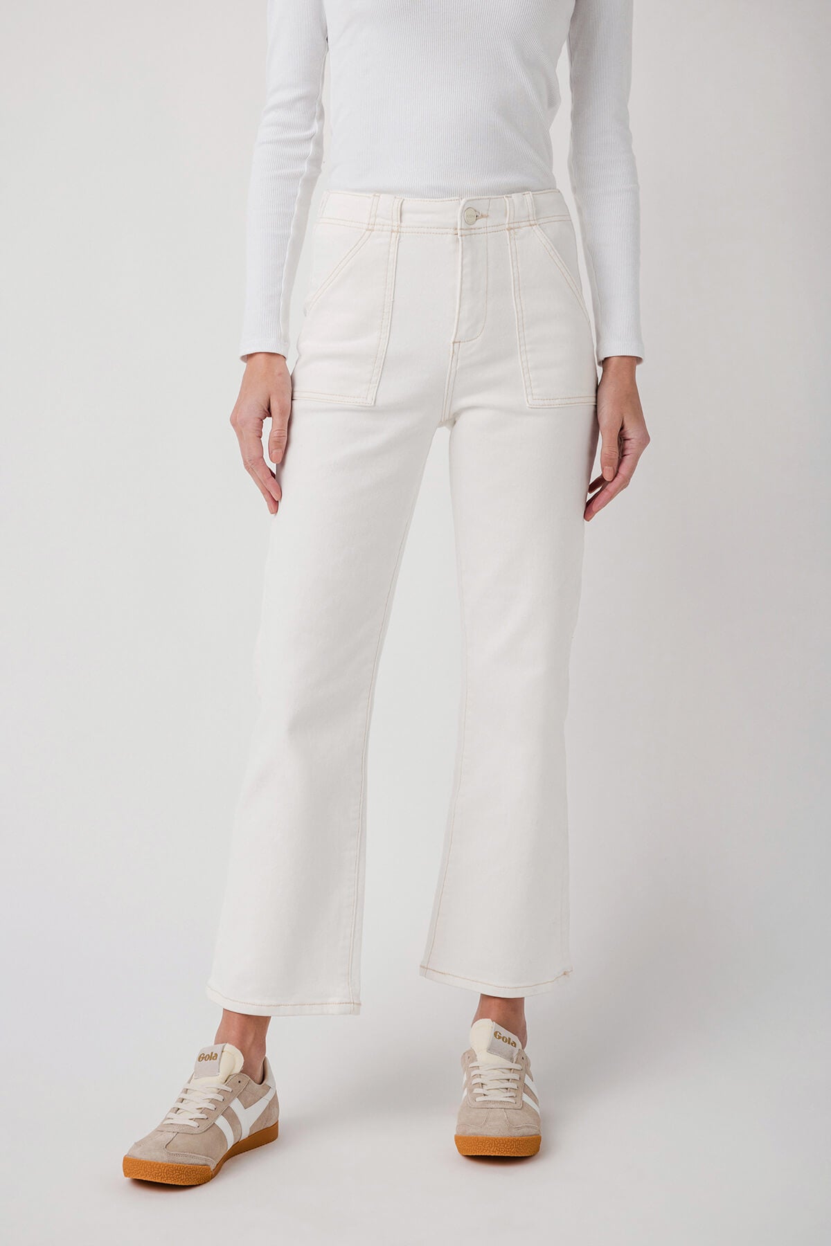 Cream ankle flare jeans with stitched seams, button front and cargo-style pockets