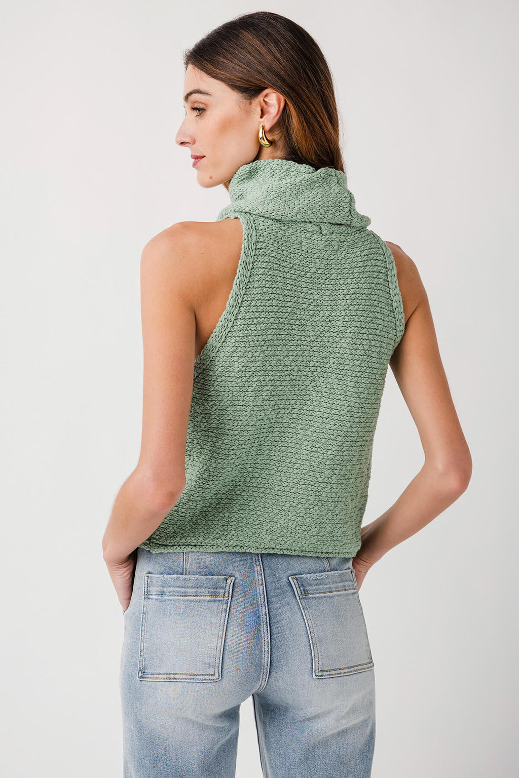 Granite green sleeveless knit top from back view with high cowl neck