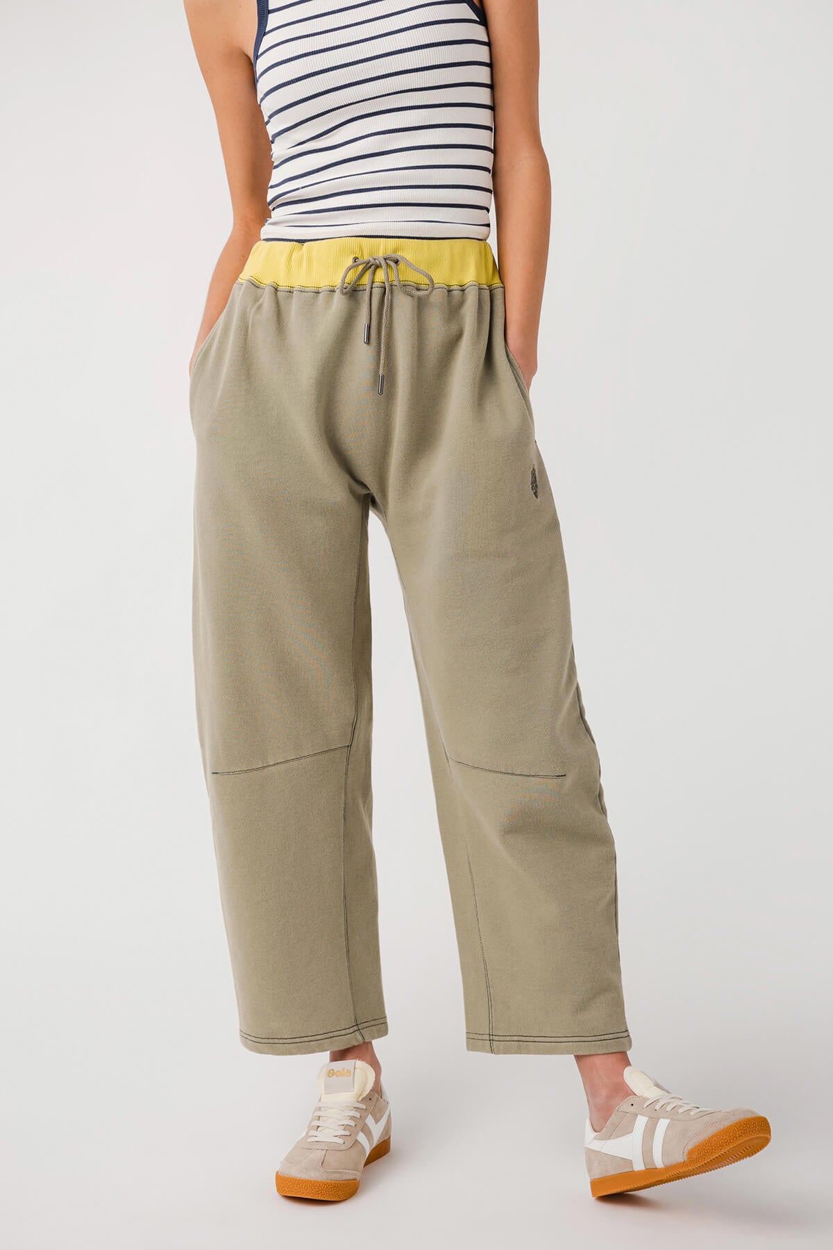 Sage green drawstring wide-leg pants with elastic waistband and side pockets