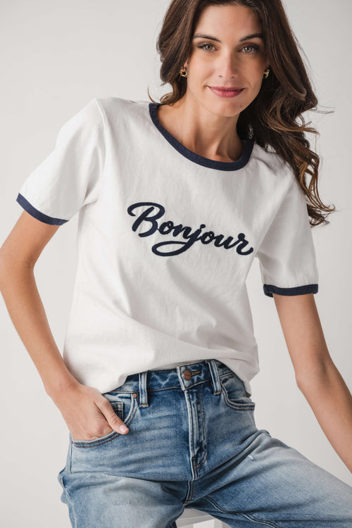 White Bonjour T-shirt with navy neck and sleeve trim, close-up front print
