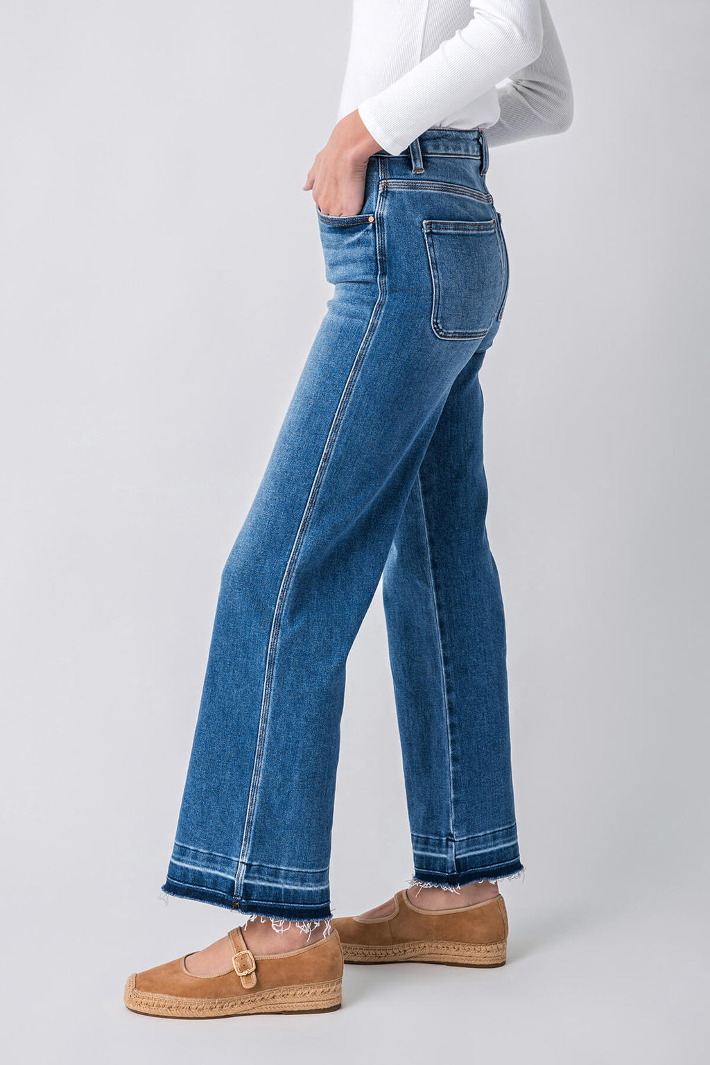 Medium blue high-rise ankle straight jeans with released hem and front patch pockets