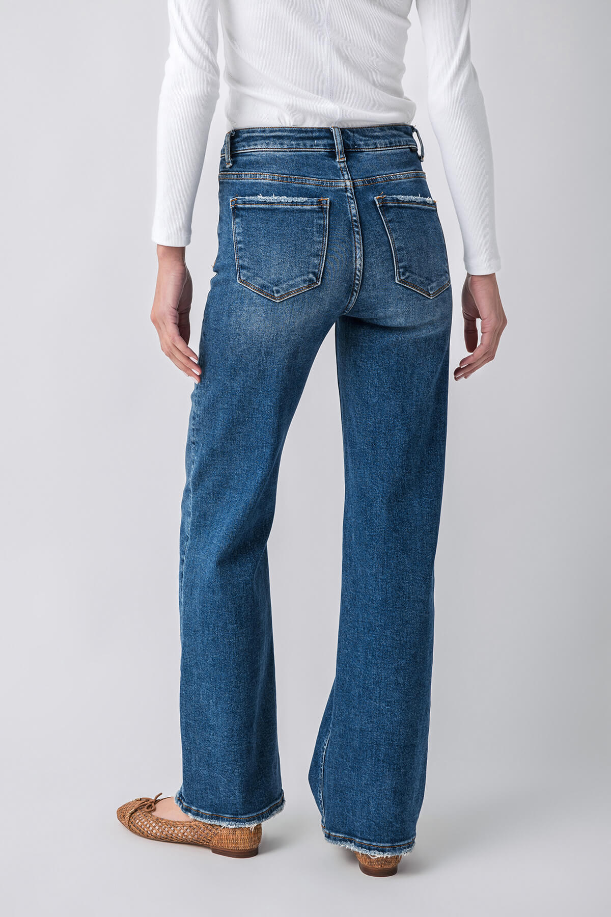 Women's dark wash high-rise straight-leg jeans, front view with belt loops and stitched pockets