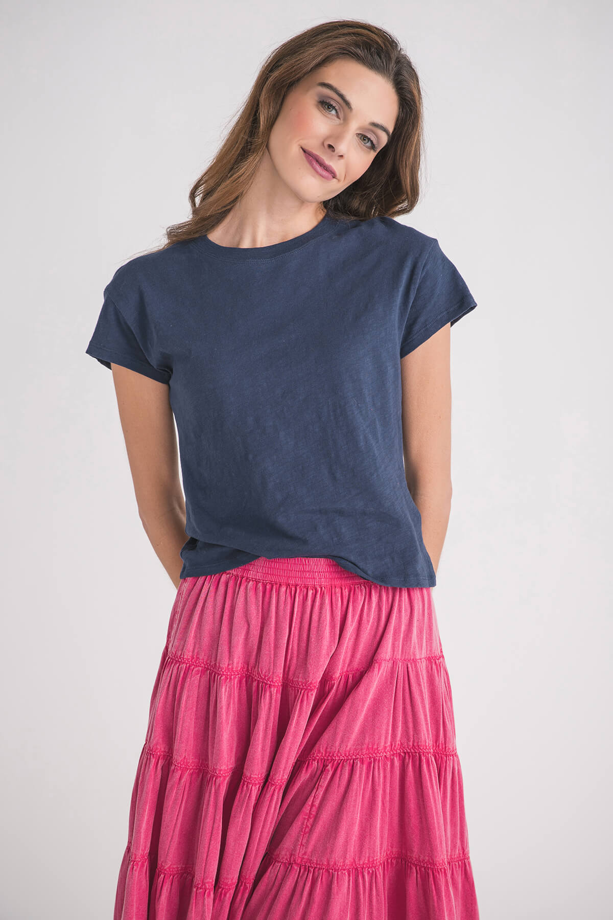 Navy short-sleeve slub tee, front view with crew neck and relaxed side drape.