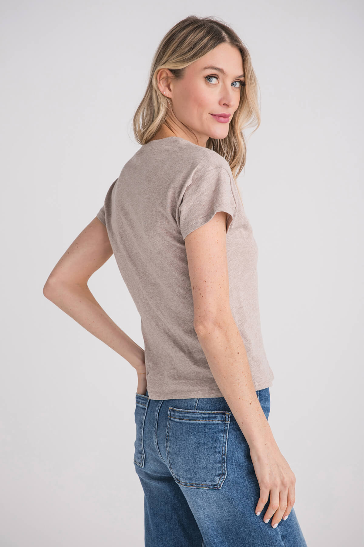 Heather gray short-sleeve slub tee, side/back view showing crew neck and hem.