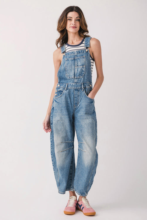 Light blue denim overalls with front pocket bib, relaxed fit and cuffed hems.