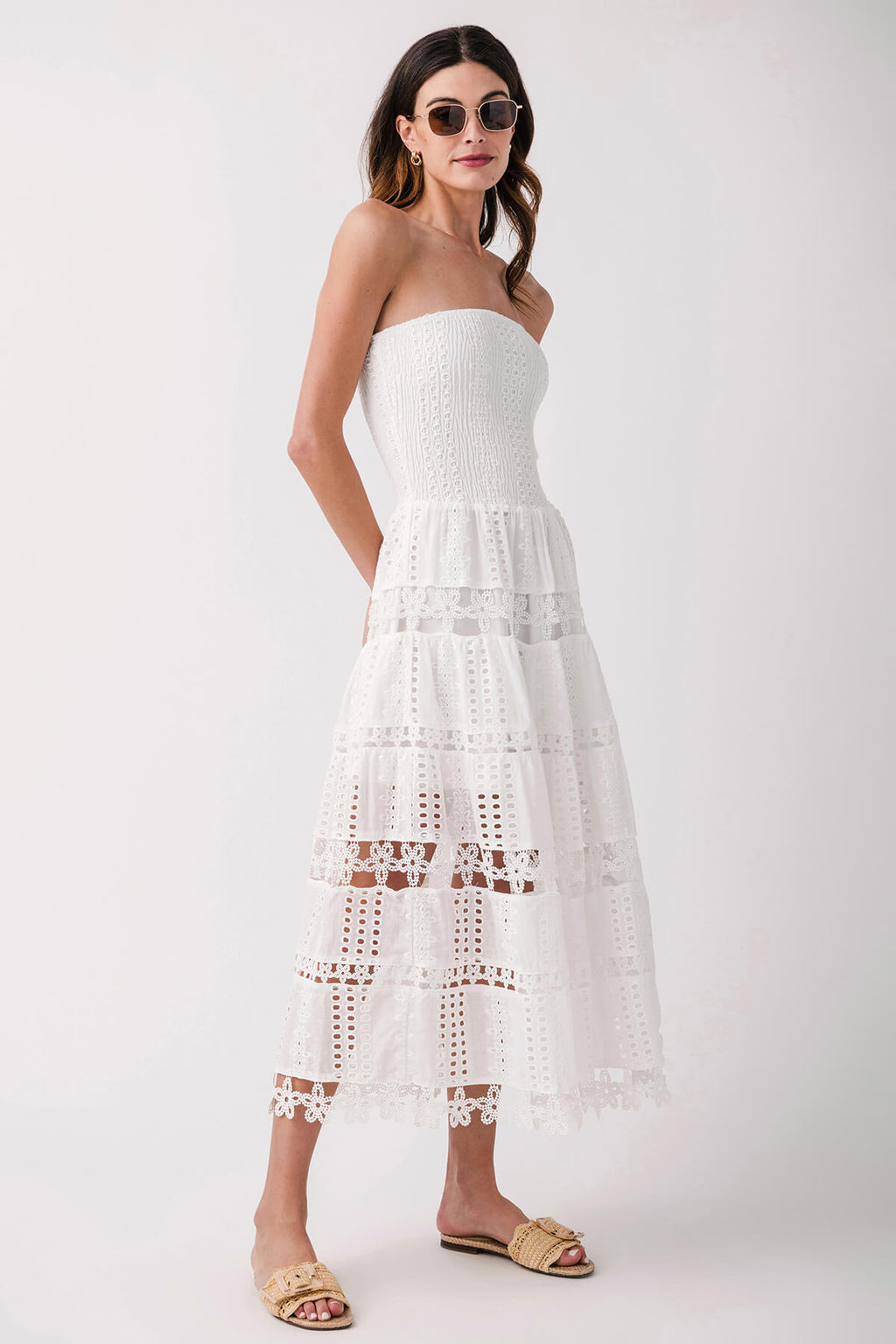 White strapless tube dress, tiered eyelet lace skirt with scalloped edges