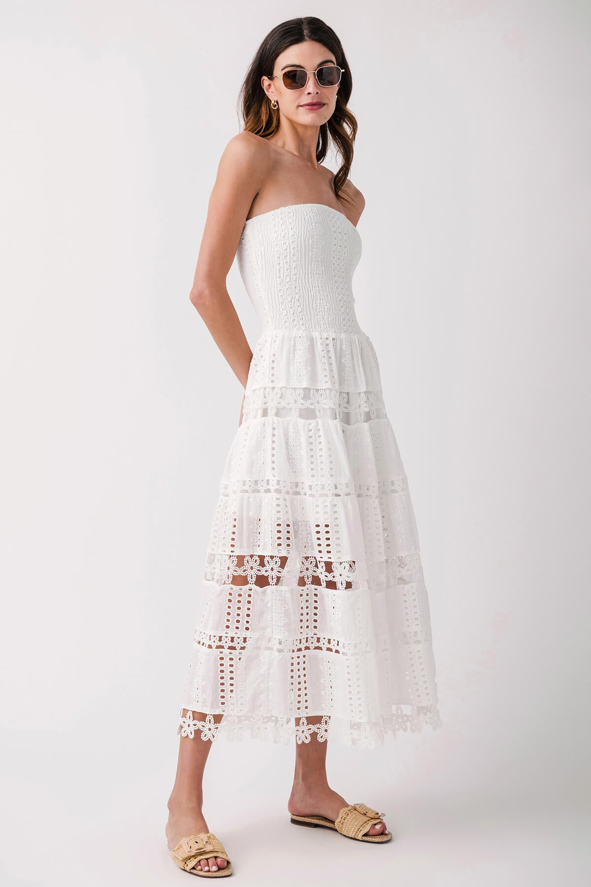 White strapless tube dress, tiered eyelet lace skirt with scalloped edges