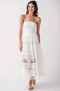 White strapless eyelet lace tube dress with tiered layers and scalloped hem